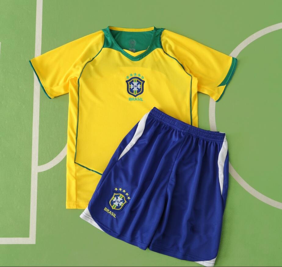 f021e54353 04 season Brazil home Kids kit - Image 1