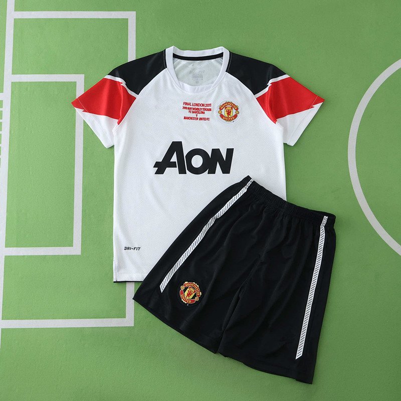 edd5bd0b63 1112 Manchester United F.C. away retro Kids kit - Image 1